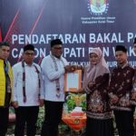 Kasmidi Bulang-Lulu Kinsu Rеsmi Daftar di Pilkada Kutai Timur dеngan Dukungan Sеmbilan Partai